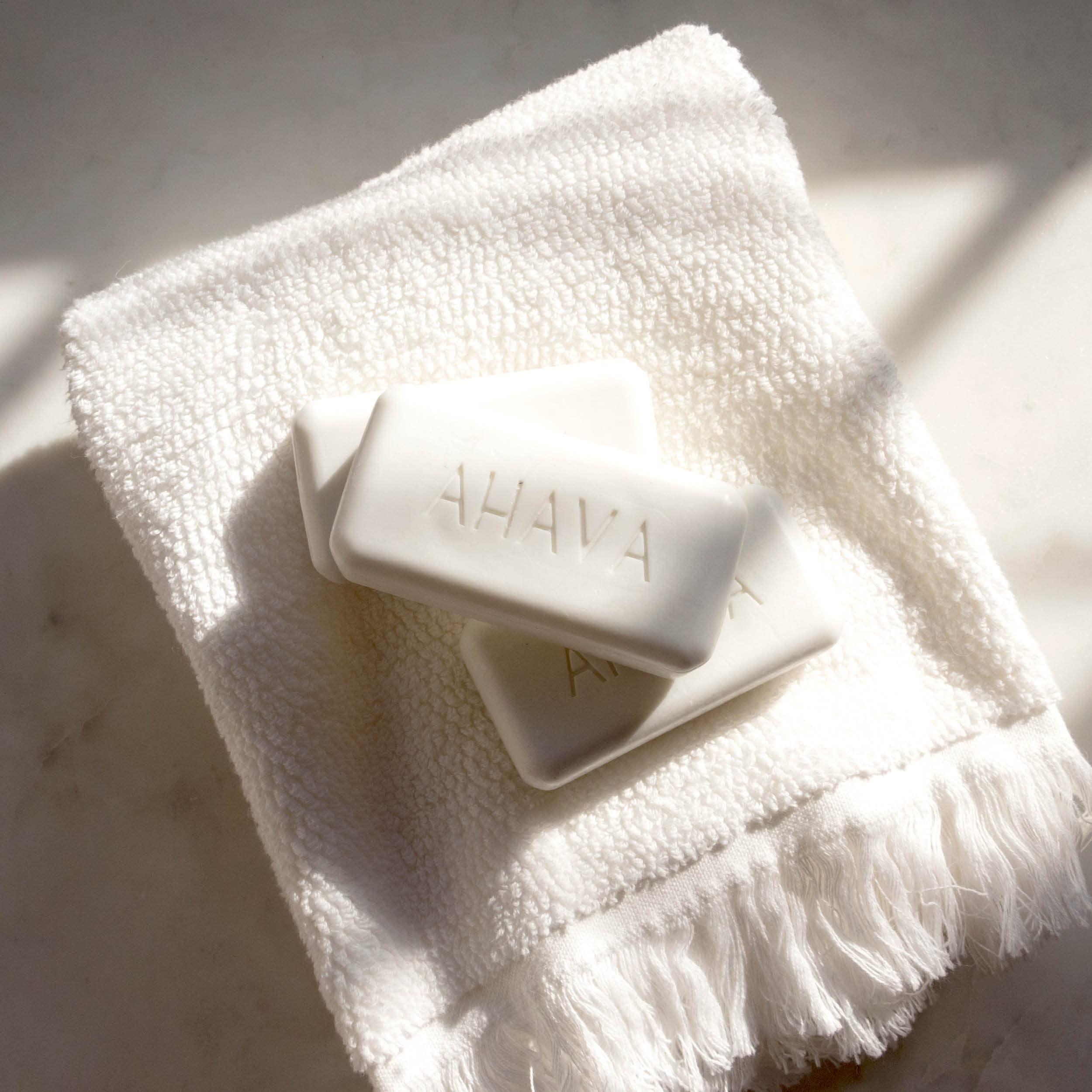 AHAVA AHAVA Moisturizing Dead Sea Salt Soap - Face & Body Cleansing Bar to Moisture the Skin, Enriched with Exclusive Mineral Blend of Dead Sea Osmoter & Dead Sea Salt, 3.4 Oz, (Packaging May Vary)